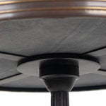 An under the table view of our Carrara marble French Bistro tables.